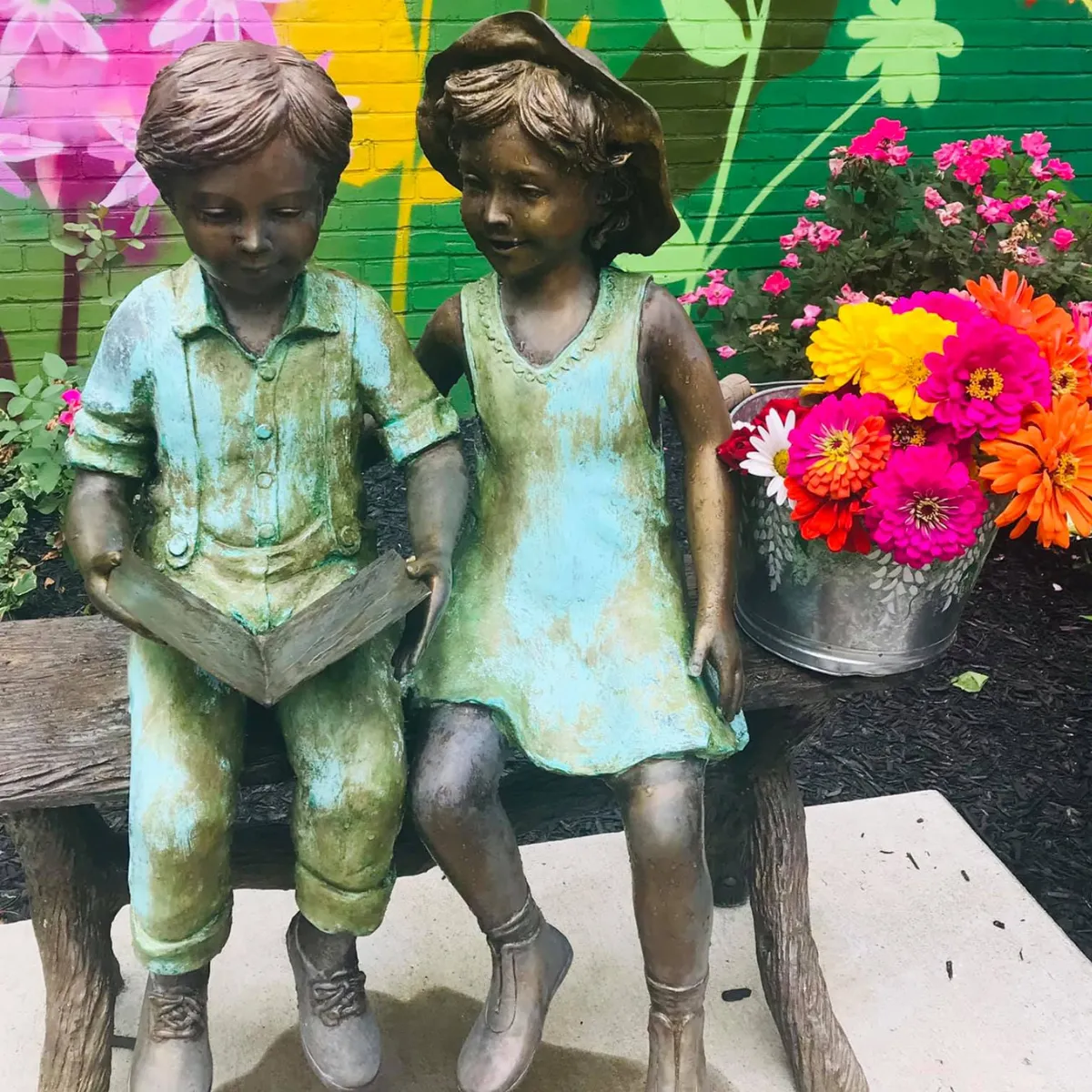 Best Friends Reading Statue