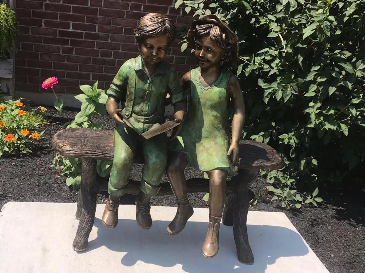 Best Friends Reading Statue