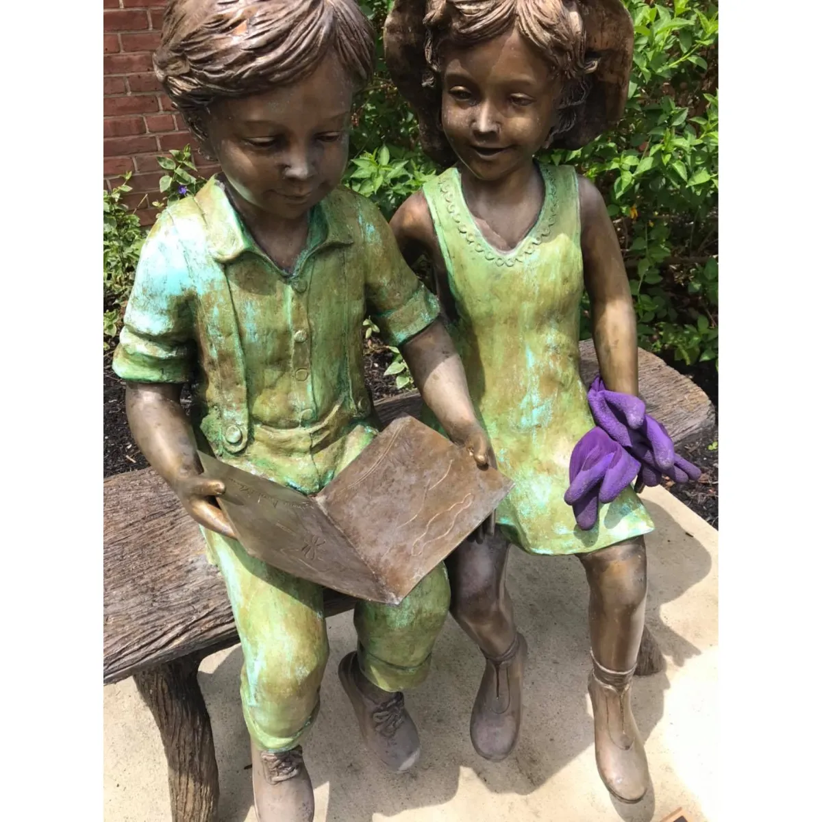 Best Friends Reading Statue