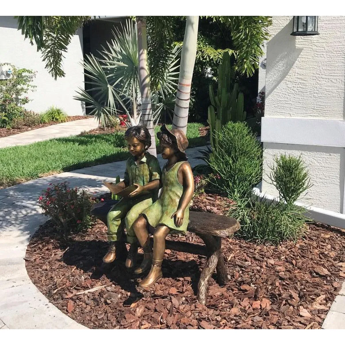 Best Friends Reading Statue